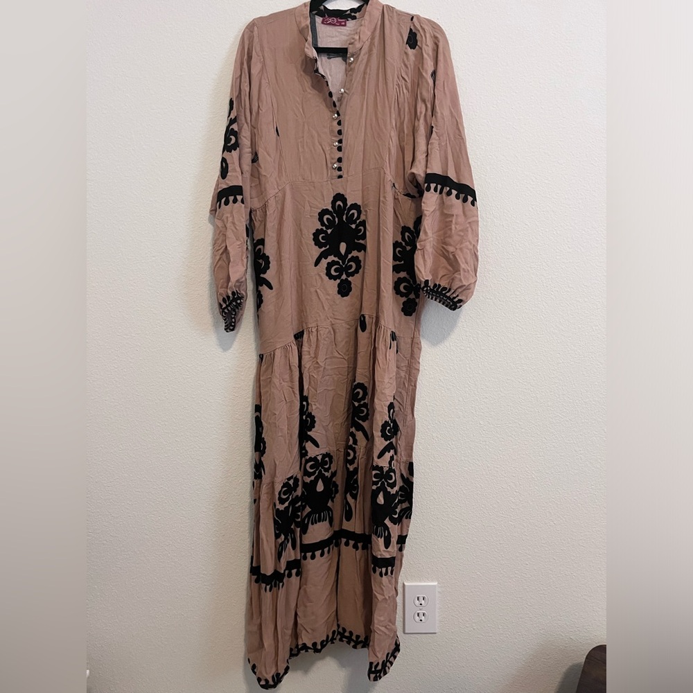 Long brown dress with black design